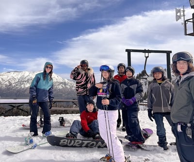 IVA High counselor Makenna Briceno snowboarding with students in Big Bear as part of the Outdoor Adventure Club.