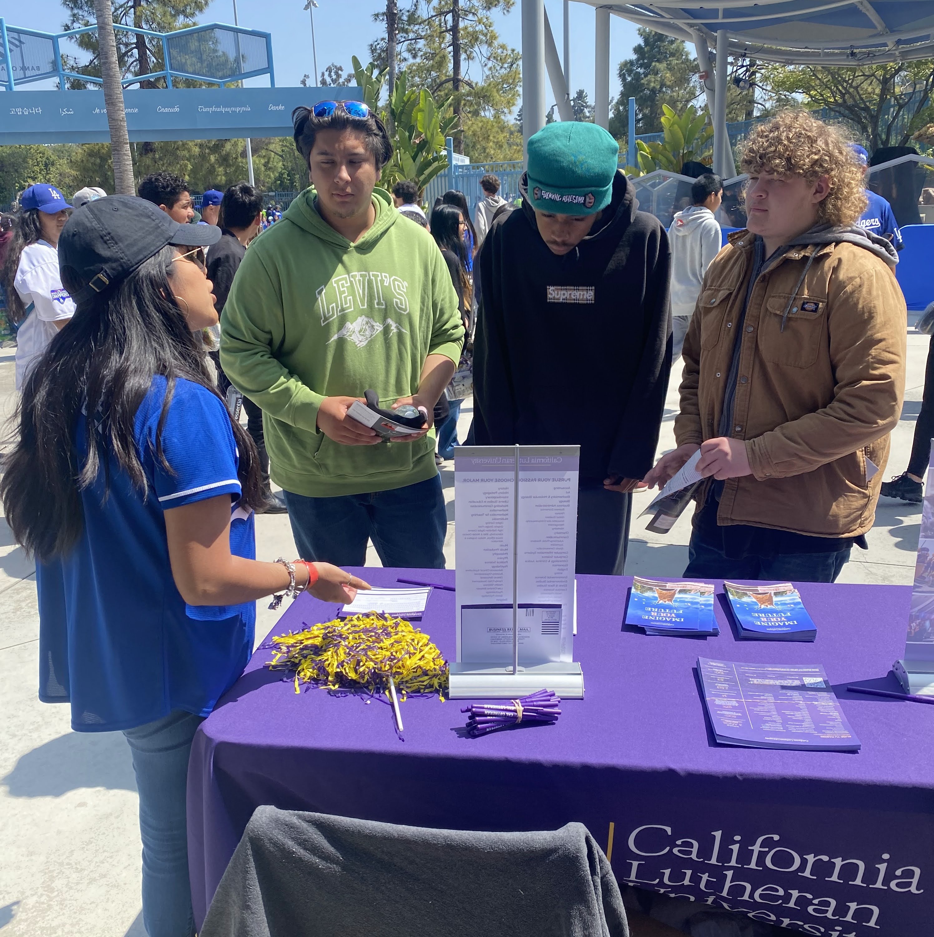 IVA High students attend college fair and speak with college admissions representatives.